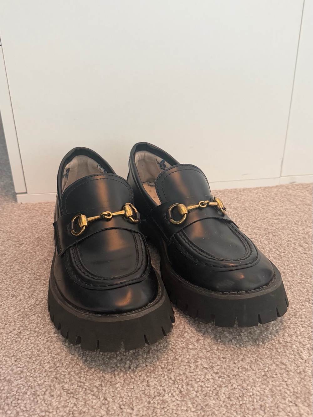 Black Gucci Loafers with Gold Hardware